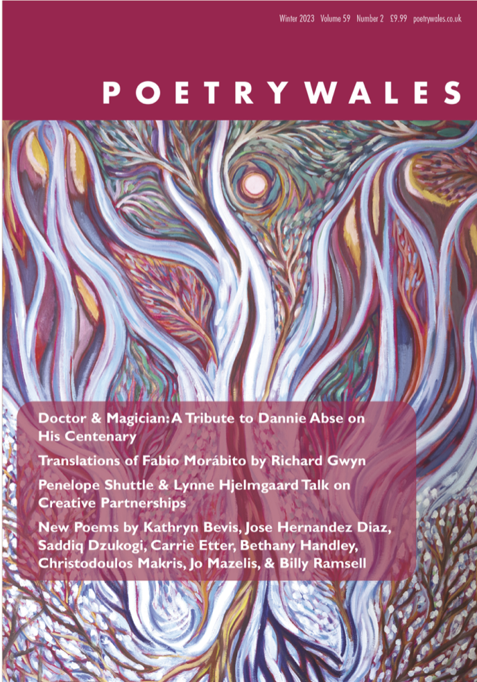 The cover of Poetry Wales is magenta and it has an image of trees or rivers winding through an abstract landscape. 